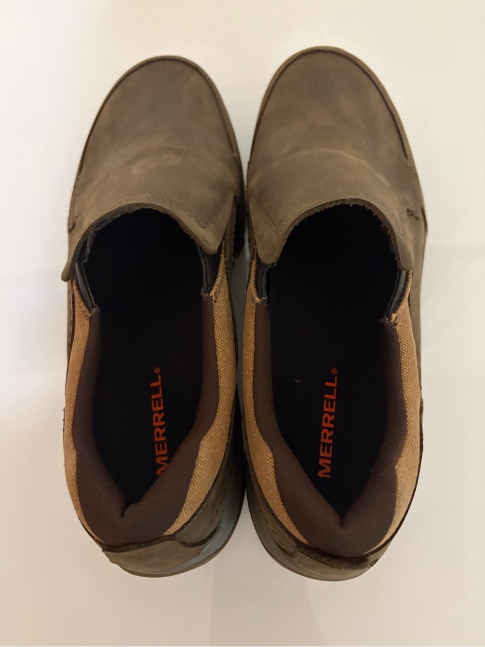 Merrell jungle moc nubuck Men’s Slip-On Shoes in Brown with Orange Logo